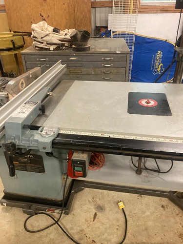 DELTA 10" UNISAW WITH ATTACHED ROUTER TABLE AND ROUTER