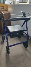 Rollator 4-Wheel Mobility Walker Dual Brakes, Seat, Storage. Foldable