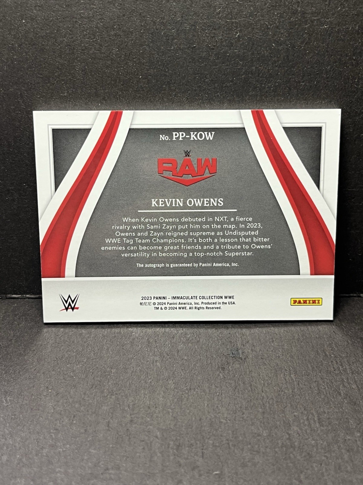 Kevin Owens Auto 2023 Panini Immaculate WWE Past and Present Red /25 On Card view 2