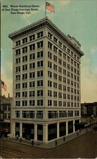 San Diego CA~Flags Above & Beside Watts Building~Home of the Savings Bank~c1910