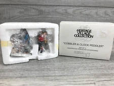 Department 56 Cobbler & Clock Peddler  #5839-4  Heritage Village Collection