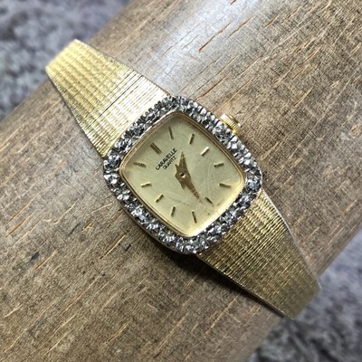 Caravelle by Bulova Women Dress Diamond Bezel Gold Tone