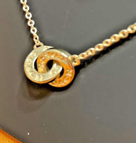 New! COACH Interlocking Open Circle Pendant Necklace