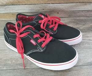 black vans with red laces