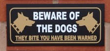 Beware of the dogs they bite you have been warned sign - All Materials
