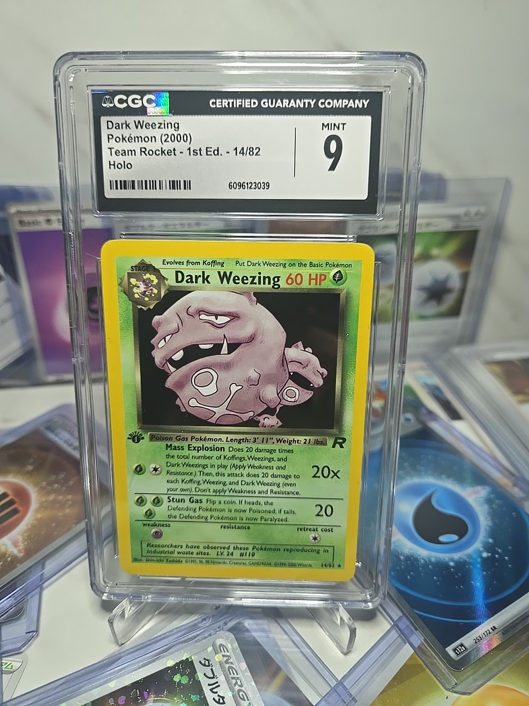 2000 Team Rocket 1st Edition Dark Weezing Holo (14/82) CGC 9