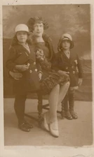 Vintage RPPC Real Photo Postcard - Mom and 2 Children hats parlor type portrait 