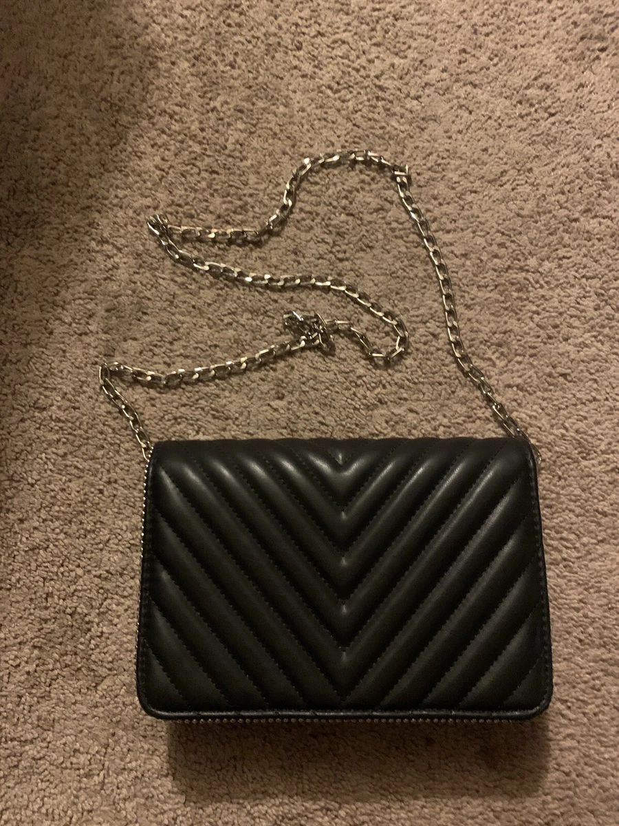 black purse with silver chain