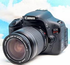 Canon EOS Kiss X5 Digital SLR Camera with Selfie Screen and Accessories