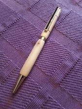 Custom made pen Crepe Myrtle with walnut inlaid cross.   Uses Cross refills  