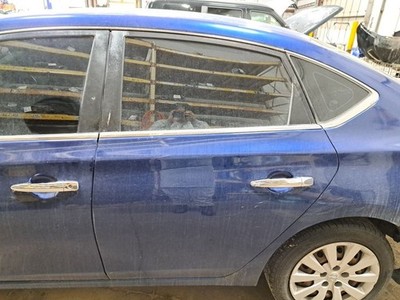 2017 Sentra Left Driver Side Rear Door Assembly Color: Blue Ray