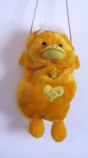 A HANDMADE BAG PURSE FOR A GIRL IN A YELLOW FUR DUCK SHAPE HANDS WARMER TOTE