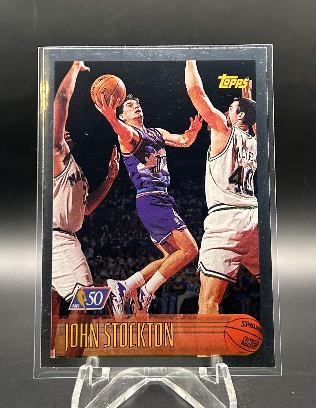 John Stockton #123 Basketball Cards 1996 Topps trading card — raw and PSA graded price guide