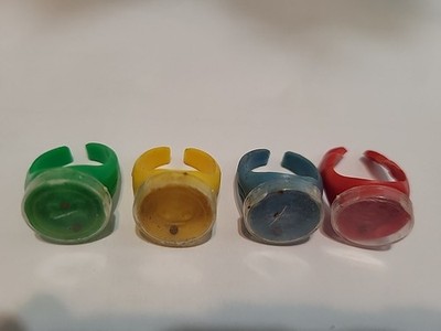Lot of 4-1950s QUAKER & KELLOGG PEP CEREAL PUZZLE TOY RINGS