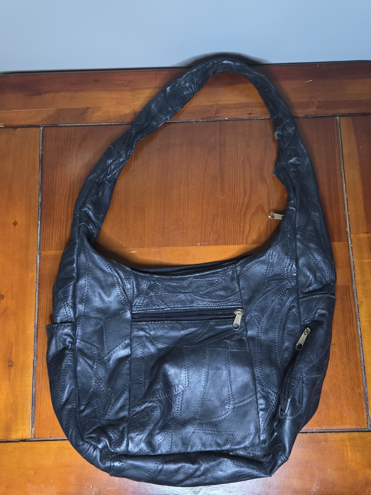 vintage black patchwork leather hobo bag, multi-textured leather