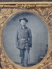 Civil War tintype of armed Union soldier w/ sword patriotic case sack coat