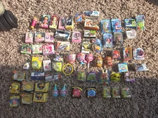 Mini Brands Lot.  64 Pieces Of Various Toys And Games.