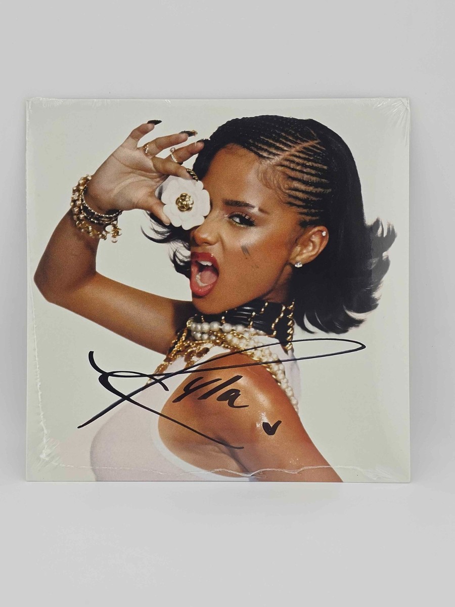 Tyla CHANEL Signed 7