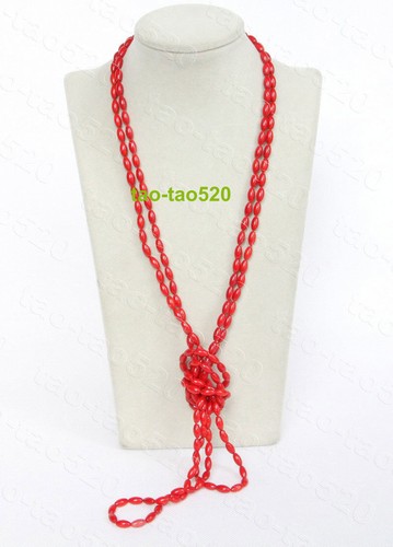 Collier long naturel 50" 5X9mm ovate riz rouge perles corail brin 18KGP j12332t