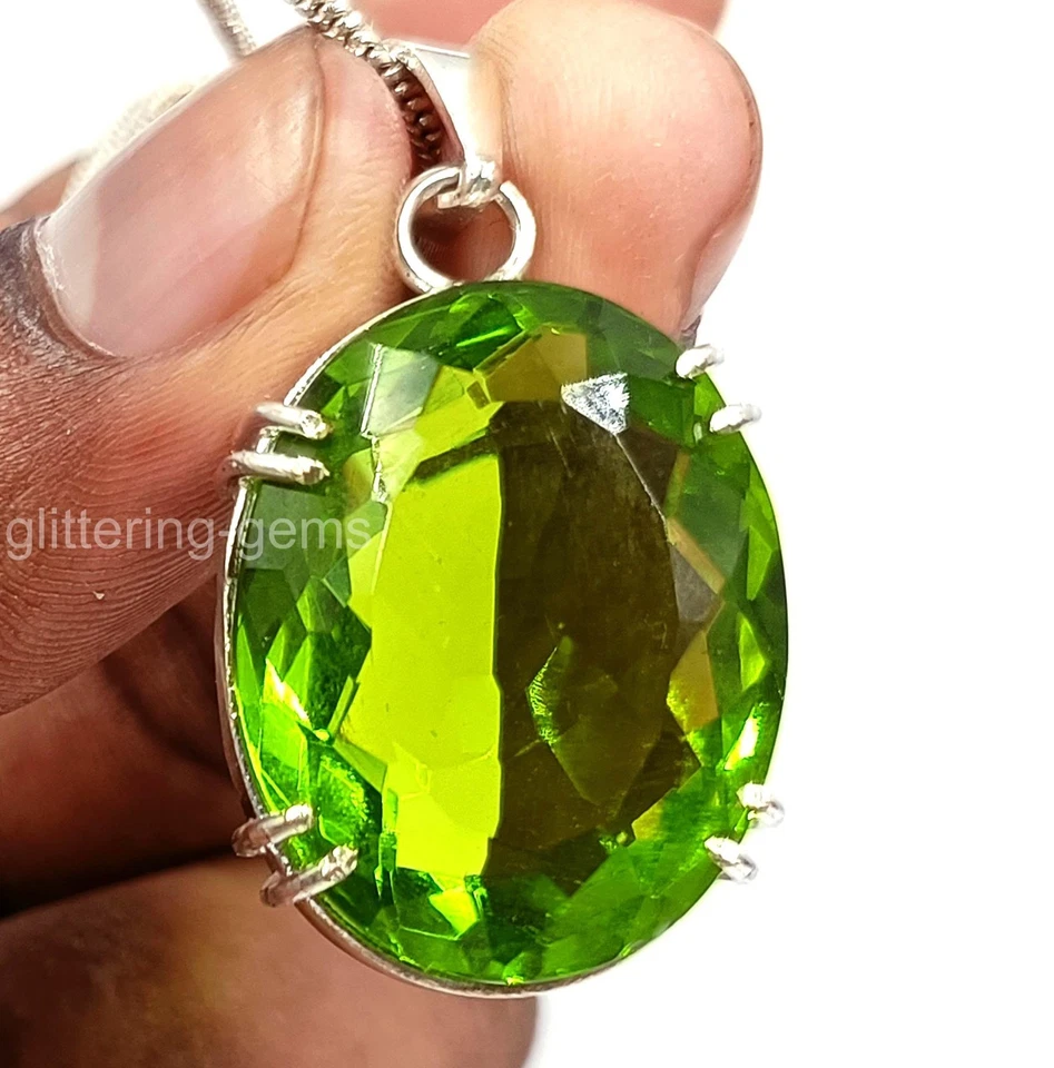Colgante gema ovalada de 53,65 quilates de peridoto verde natural certificado IGL 5DOH Foto 4 de 4