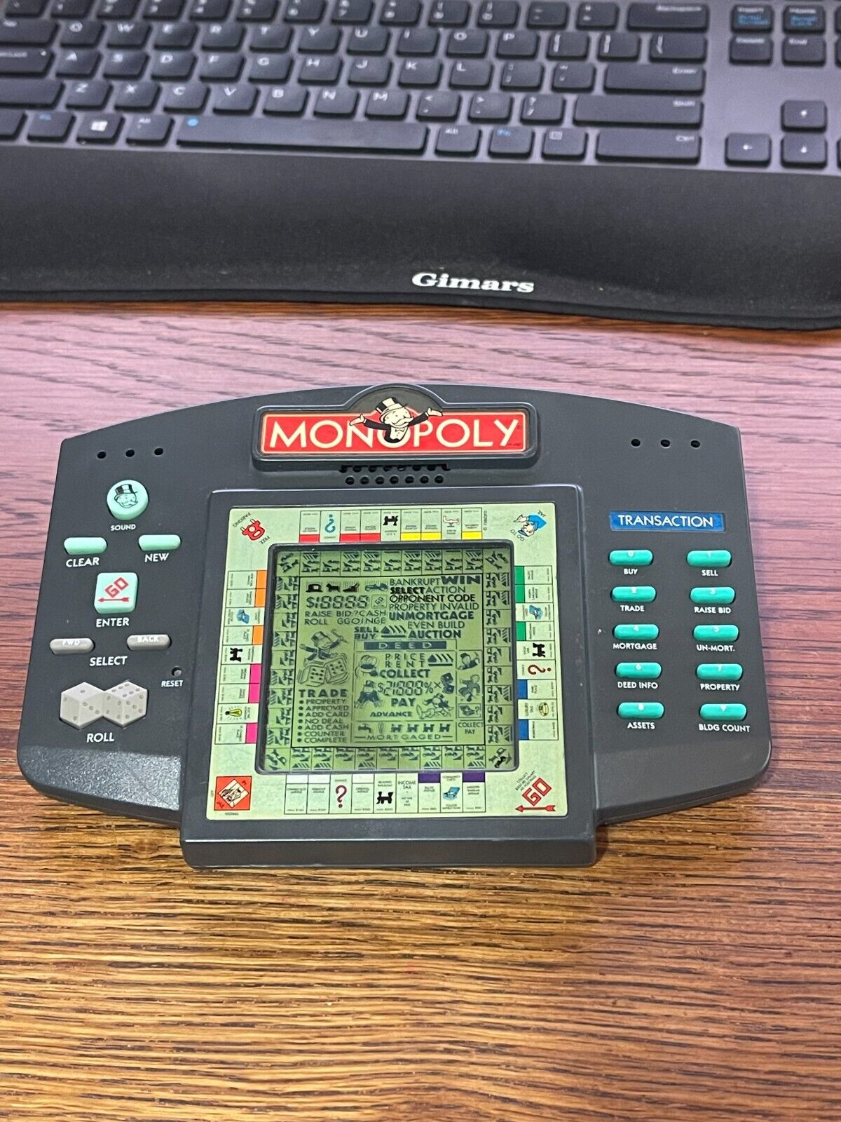 1999 Hasbro Handheld Monopoly Electronic Video Game R7473