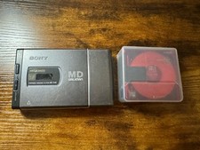 Sony MD Walkman MZ-E40 Portable MiniDisc Player W/ 5 Minidiscs. No Battery Cover