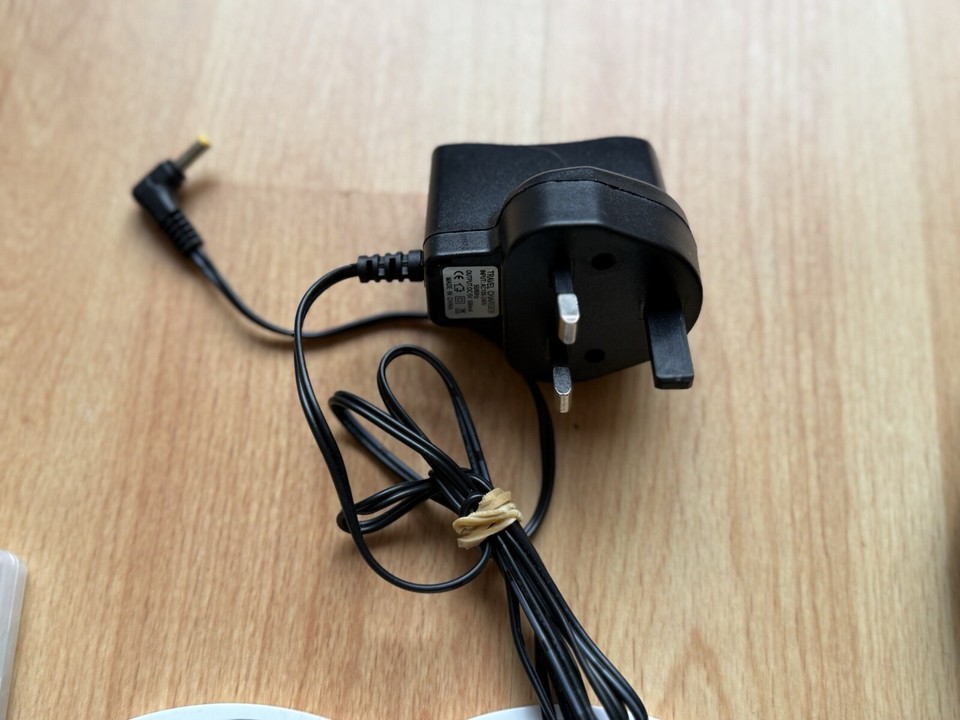 Sony PSP Handheld Game Console Black with Charger, 5 Games & 10 UMD