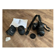 Nikon D3100 DSLR Camera Bundle + 18-55mm VR & 55-200mm Lenses, Charger & Manual