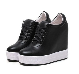 black hidden wedge trainers