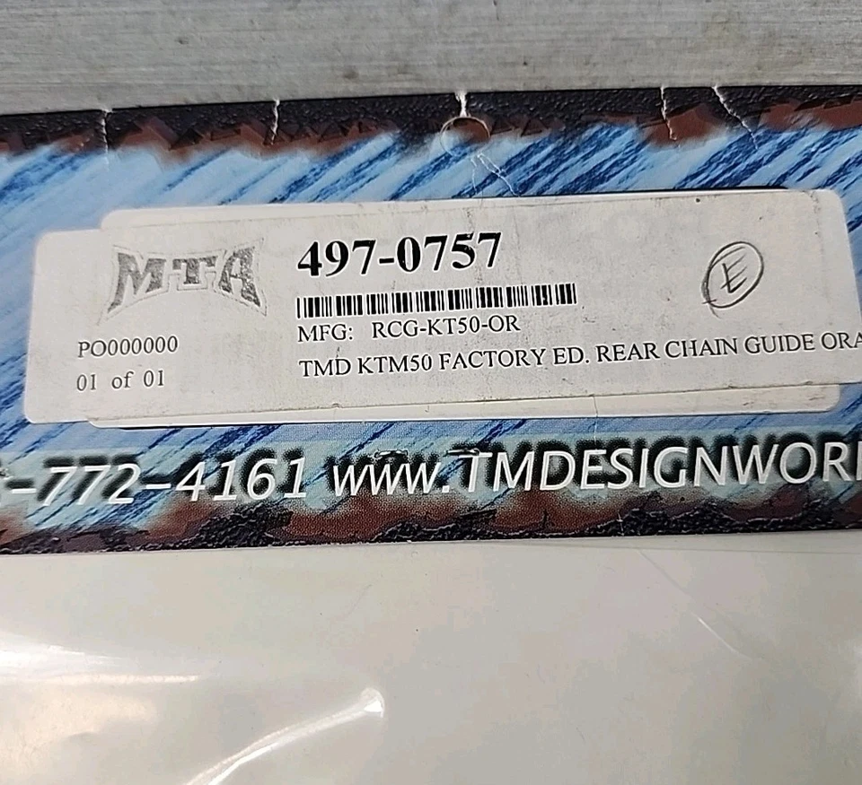 Guía de cadena trasera naranja TM Design Works RCG-KT50-O KTM 50 SX 2007-2015 Foto 3 de 3