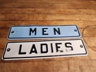 Vintage Men & Ladies embossed tin signs