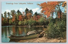 Greetings from Lafayette IN Indiana Canoe on Shoreline Autumn Day Postcard