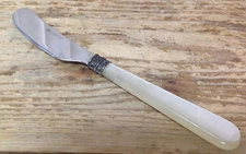 1 Lorena Butter Spreader Knife Signed MOP Ivory Color Pearl Handled Stainless