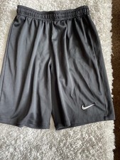 Nike Dri Fit boys sz. 5 black shorts.  longer style . Nice pair