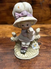 VINTAGE ARTMARK GIRL FIGURINE GIRL SITTING ON BENCH HOLDING KITTEN