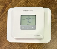 Pre Owned Honeywell Home TH1110D2009 Pro Series Non-Programmable Thermostat.