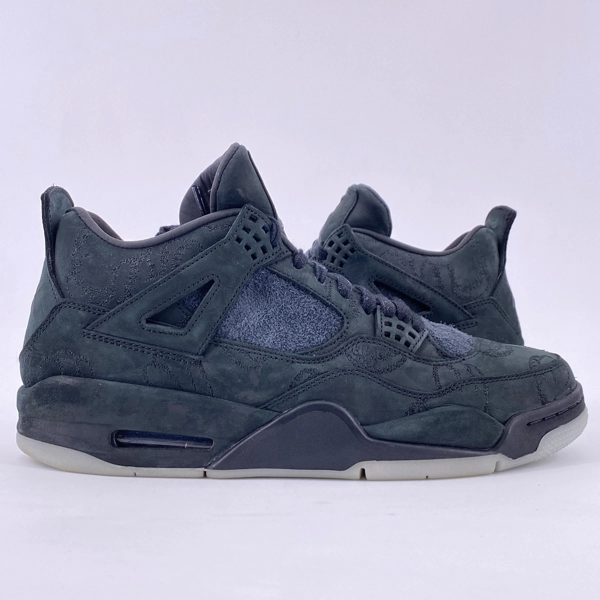 Jordan 4 Retro x KAWS Black for Sale - Authenticity Guaranteed - eBay
