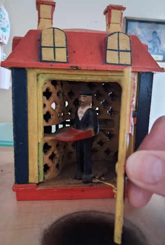Novelty Bank Mechanical Bank House with Man Figure Red and Yellow