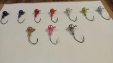 100-1/4 oz round head jigs with ball collar 1/0 jig hook assorted colors.