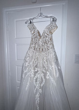 Ivory White Lace Sleeveless V Neck Ball Gown Wedding Dress with Train