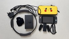 Nintendo Switch Console bundle with Ring Fit and Pikachu case