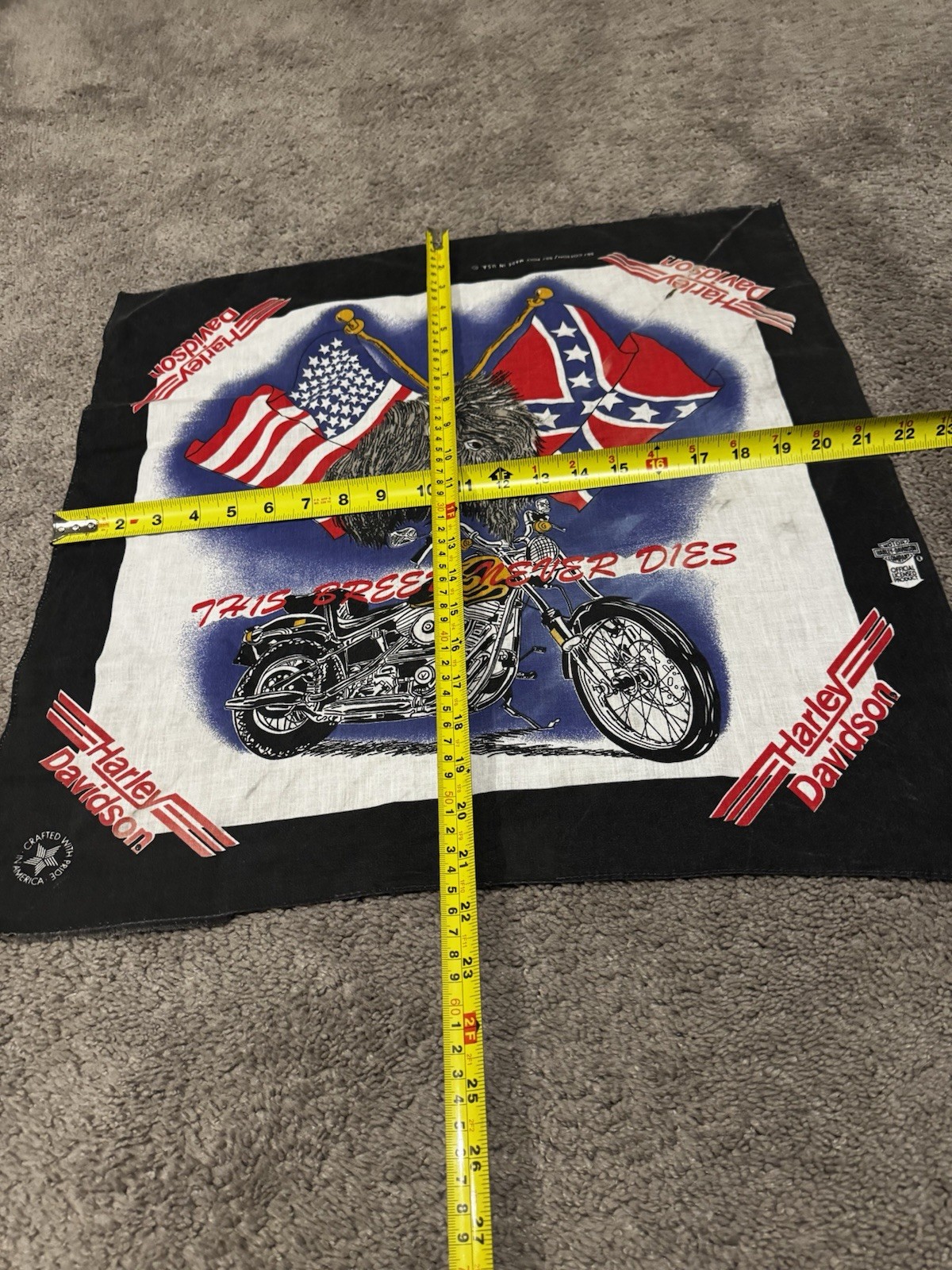 Black vintage Harley Davidson bandana with white “The Breed Never Dies” text, red, white, and blue American flag design.