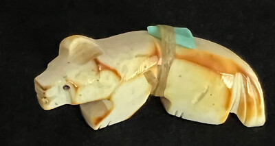 Carved antler Wolf fetish by Zuni artist Marlo Booqua with bundle