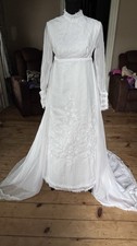 Empire waist , high neck long sleeve wedding dress
