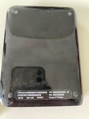 wd my passport ssd 1tb used but fully working in glossy black (scratches)