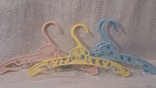 Vintage set of 4 plastic baby clothes hangers with animals, deer, bunnies,ducks