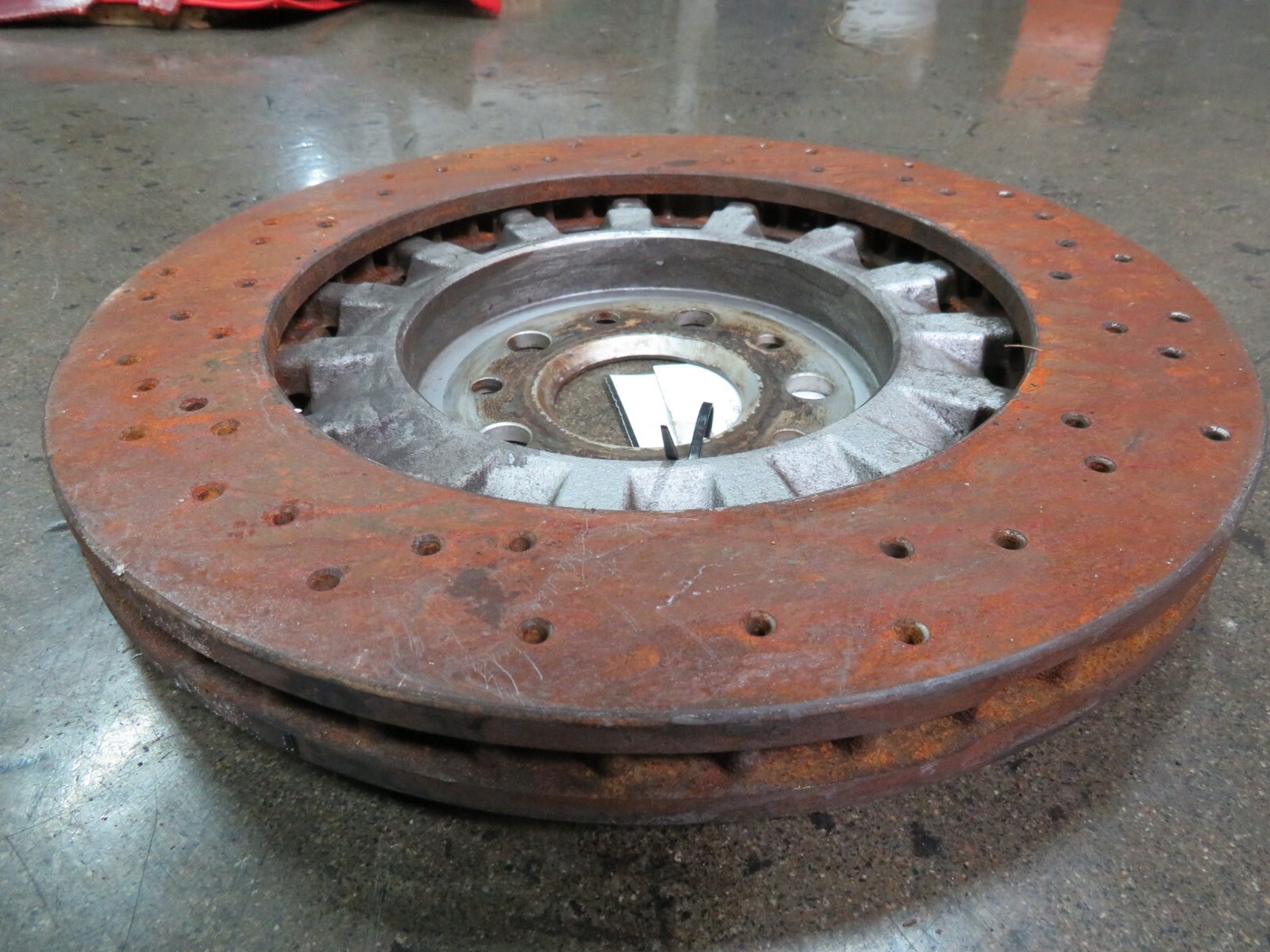 2014 Maserati Quattroporte, Front Brake Rotor, Cross Drilled, Used P/N 673003970
