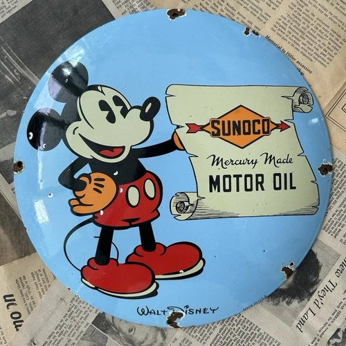 VINTAGE SUNOCO MOTOR OIL WALT DISNEY 12 INCH CONVEX PORCELAIN ENAMEL SIGN