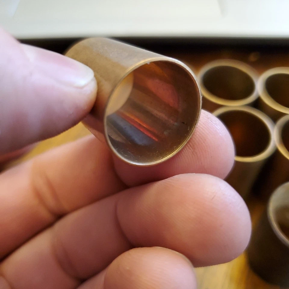 NOS Solid Round Lincoln Zephyr Piston Pin Bushings (12) PB773 - Imagen 2 de 3