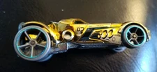 2007 Hot Wheels Rocket Fire Car #02 Gold W/ Blue Trim. Made In Malaysia L9937